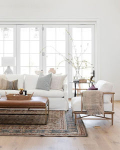 white sofa and modern chair